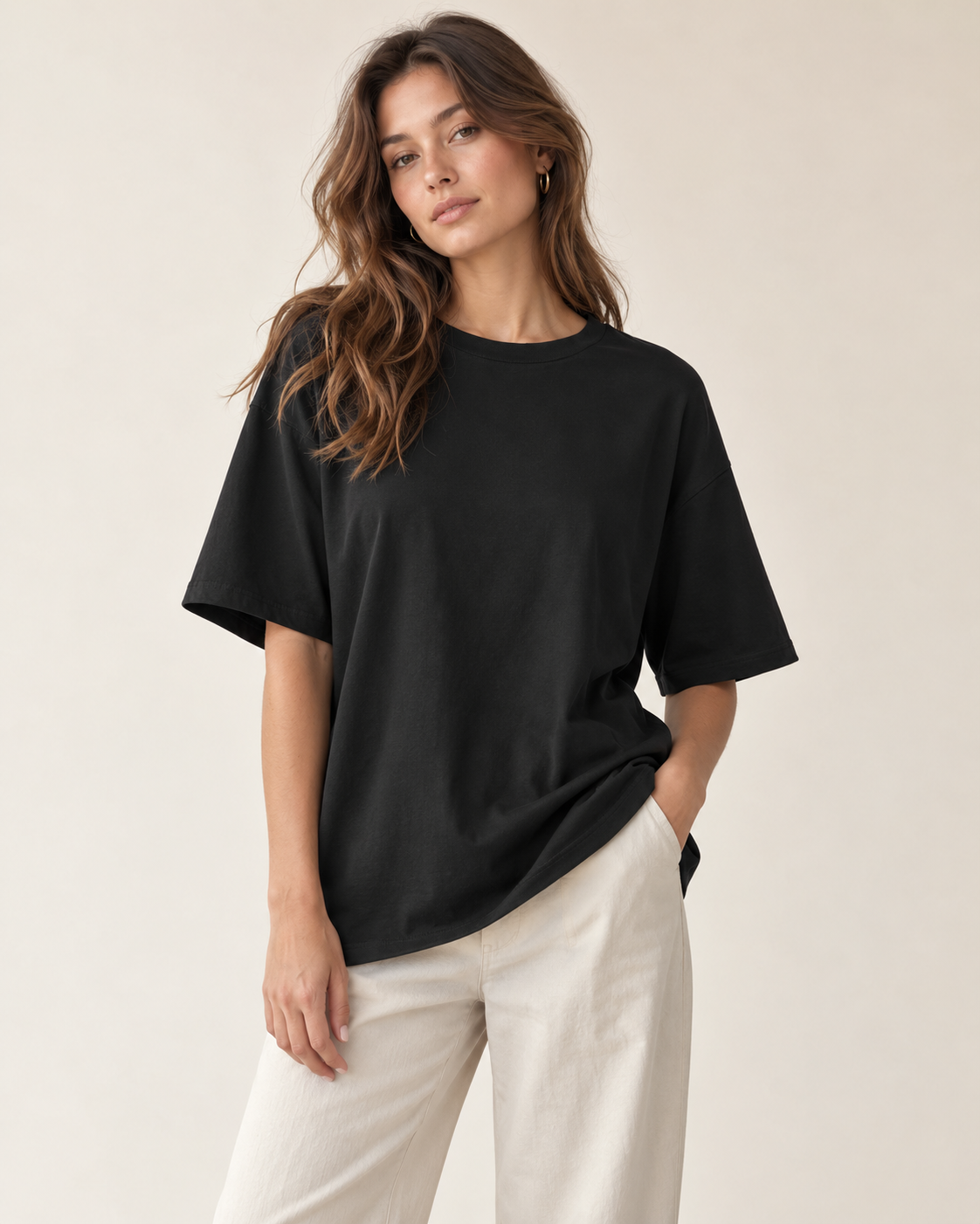Woman wearing Liora essential oversized t-shirt in black