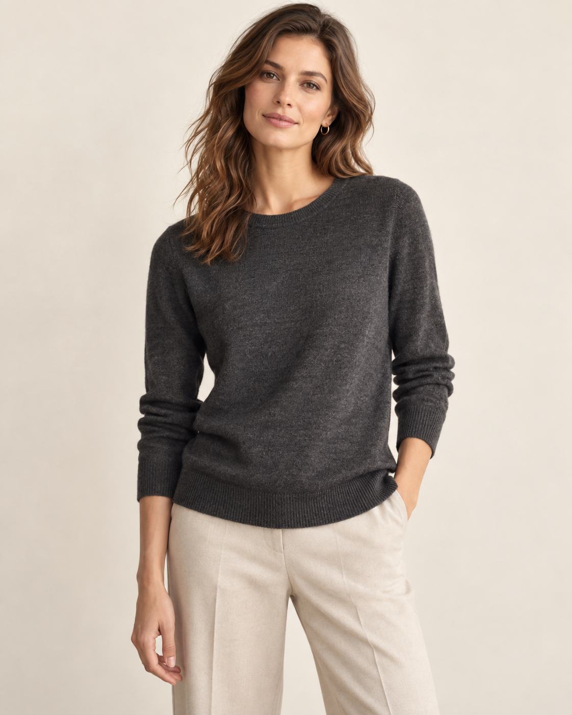 Woman wearing Liora classic crewneck sweater in charcoal